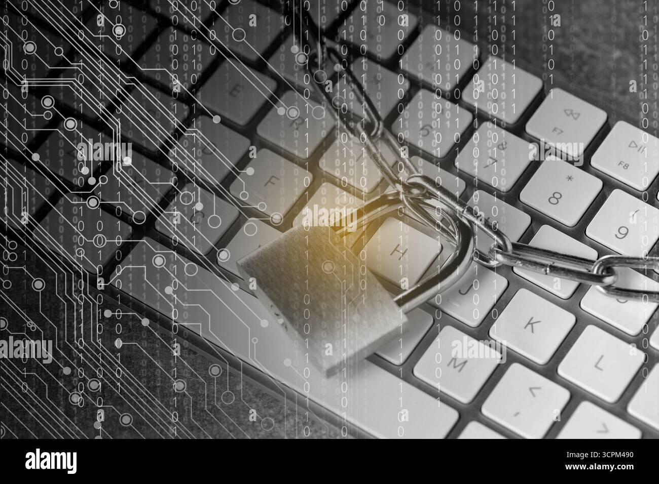Padlock and chain on computer keyboard, closeup. Circuit board pattern and binary code. Cyber security Stock Photo