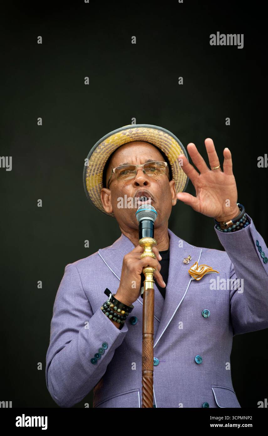 José Massó III, José Massó, on stage at the start of the second annual Embrace Massó ¡Con Salsa! music festival on the Boston Common.  75-year-old Massó has hosted a radio program on WBUR (Public Radio) in Boston, MA, for 50 years. Both Massó’s weekend bilingual radio program and the international music festival celebrates Afro-Latin music. The festival signals the start of Latinx Heritage Month. Stock Photo