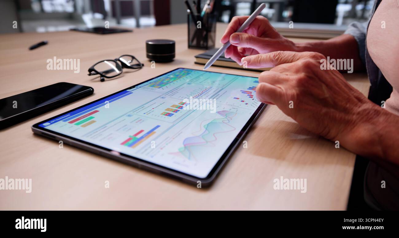 Data Analyst Using Data Analytics KPI Dashboard Stock Photo