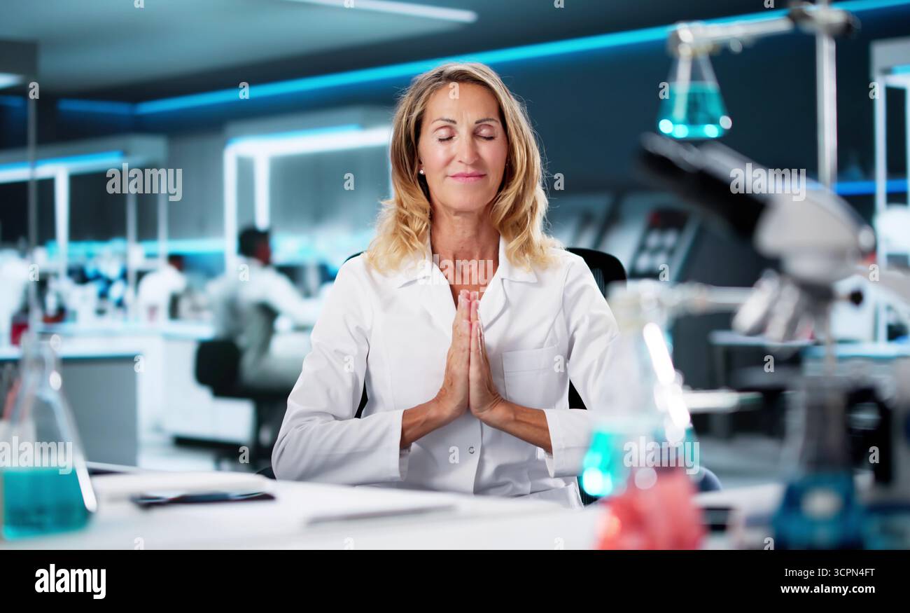 Pray Computer Connected To God: Woman Praying In Front Of Computer Stock Photo - Alamy