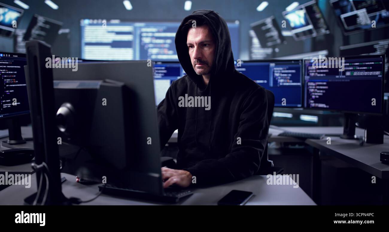 Elderly Man Hacking Computer To Steal Sensitive Data Online Stock Photo
