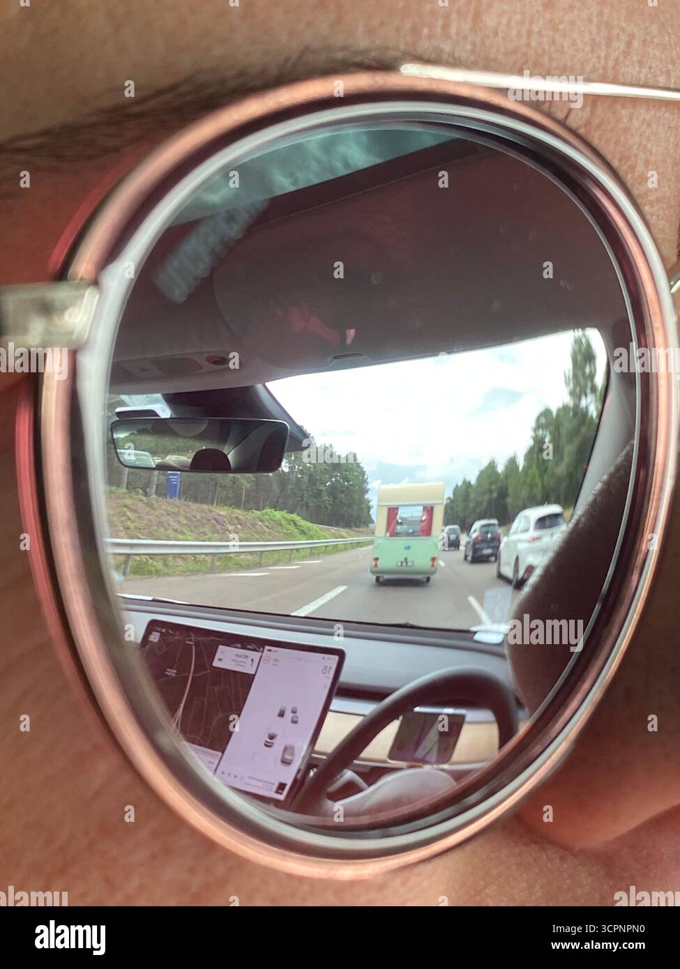 Highway Reflections: A Road Trip Captured Through Sunglasses - Smartphone Captured Stock Image