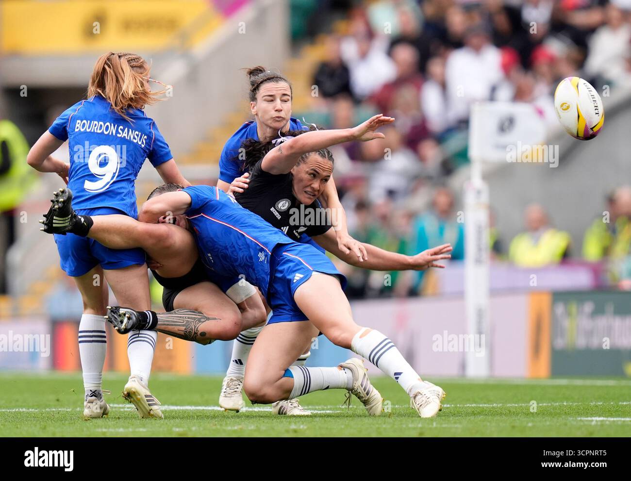 New Zealand's Portia Woodman-Wickliffe is tackled by France's Marine ...