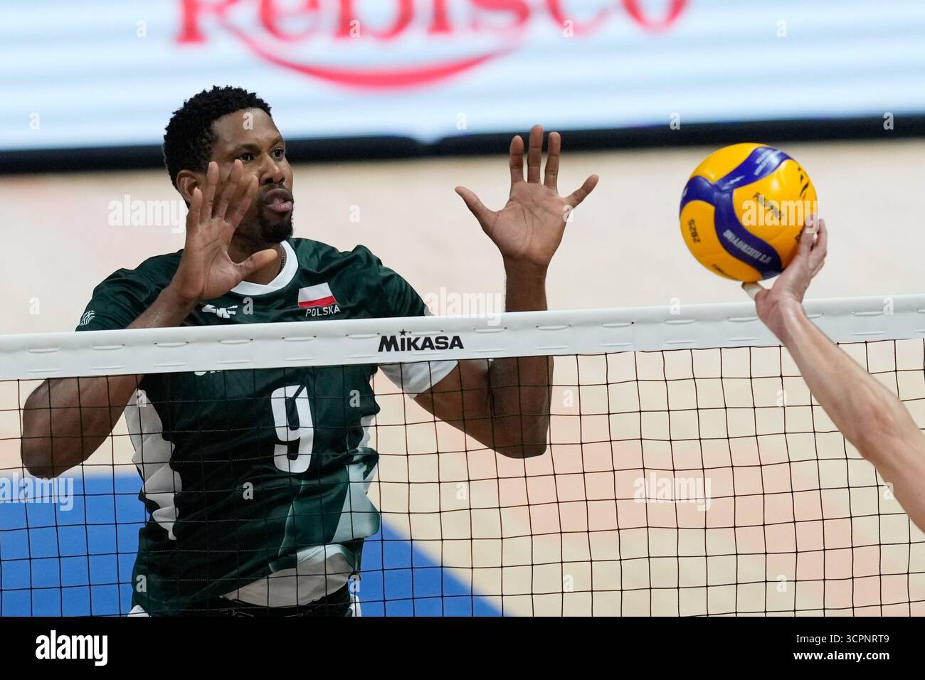 wilfredo-leon-venero-of-poland-blocks-a-shot-from-yuri-romano-of-italy