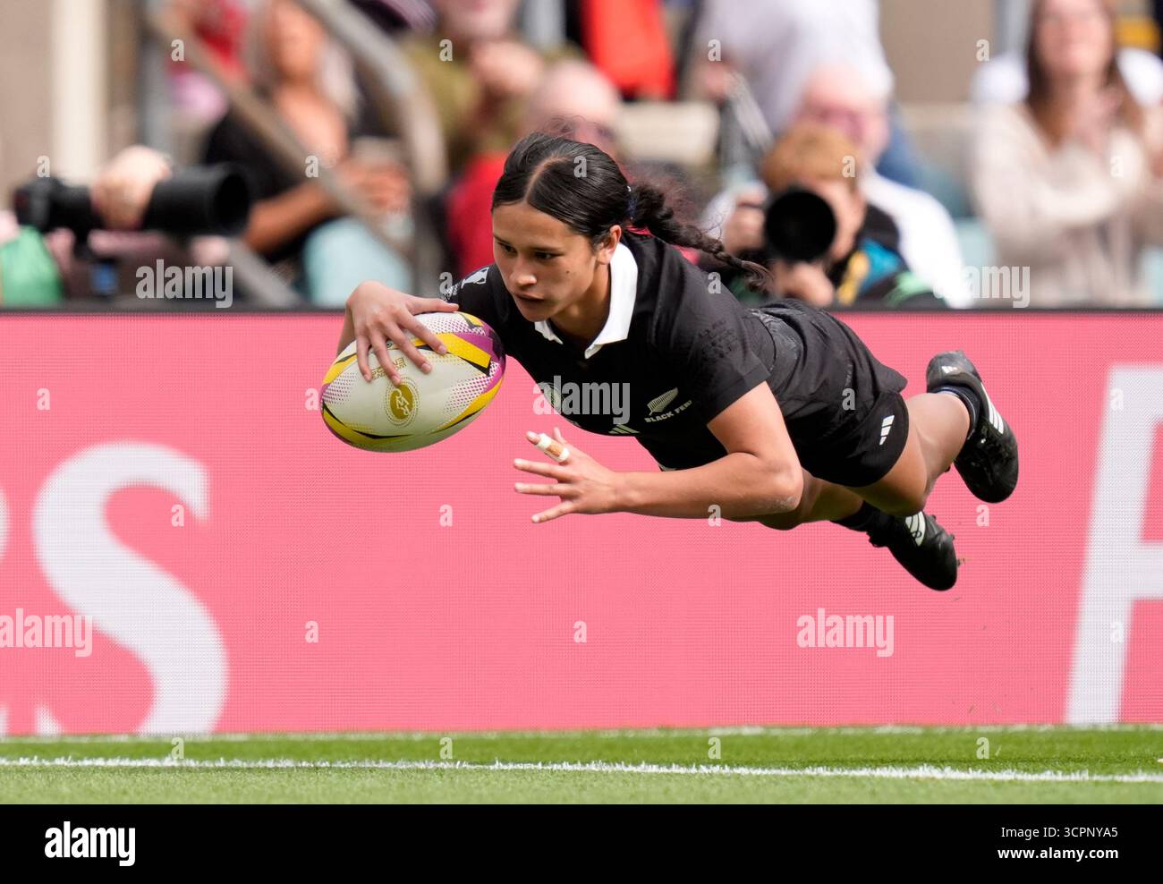 New Zealand's Braxton Sorensen-McGee scores a try during the Women's ...