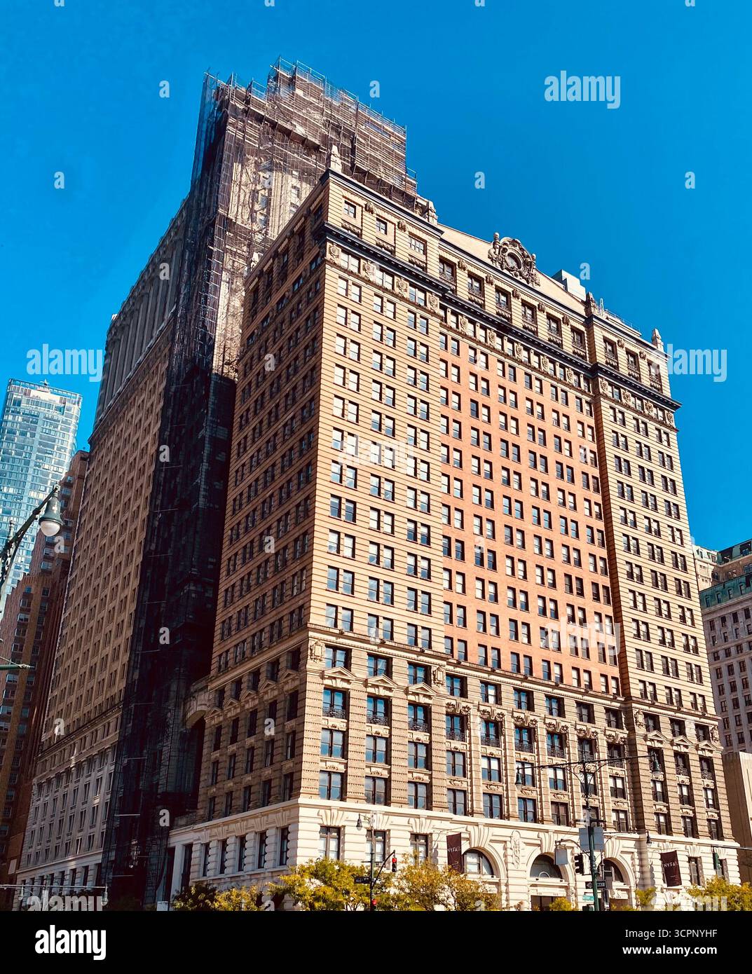 Historic Urban Building Under Renovation with Classical Architecture and Scaffolding - Smartphone Captured Stock Image