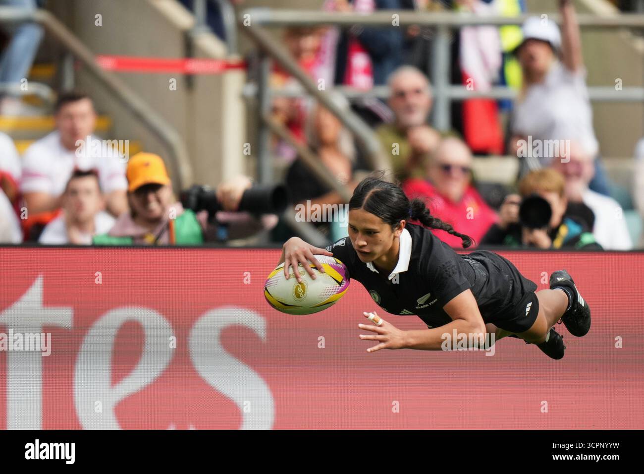 New Zealand's Braxton Sorensen-McGee scores a try during the Women's ...