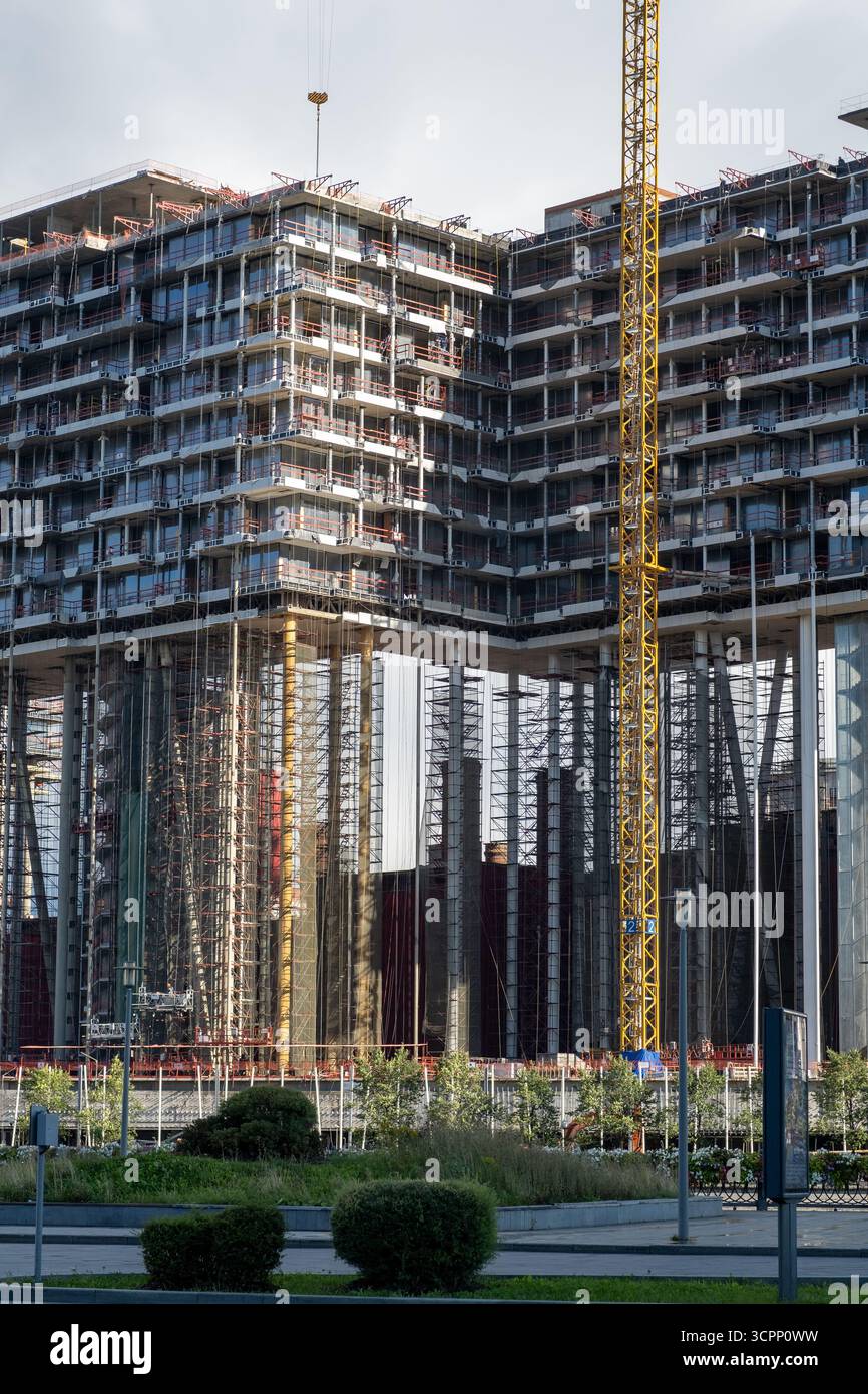 New High-Rise Building Under Construction in an Urban Area With Cranes ...