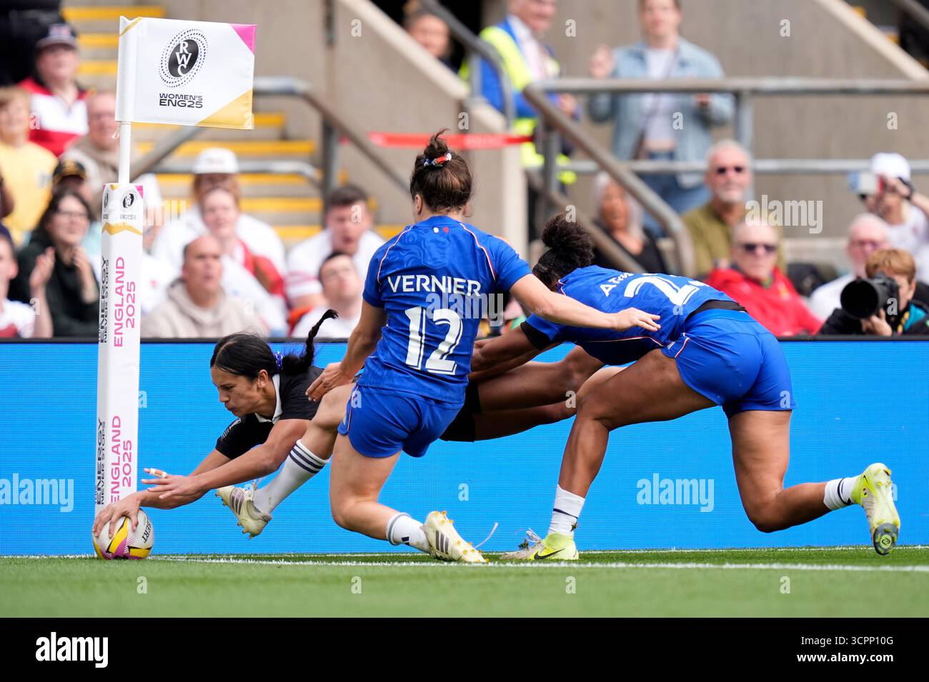 New Zealand's Braxton Sorensen-McGee (left) scores a try during the ...