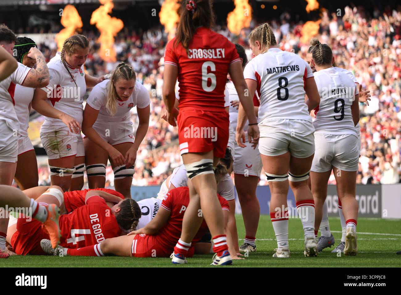 England's Amy Cokayne, bottom, scores a try during the Women's Rugby ...
