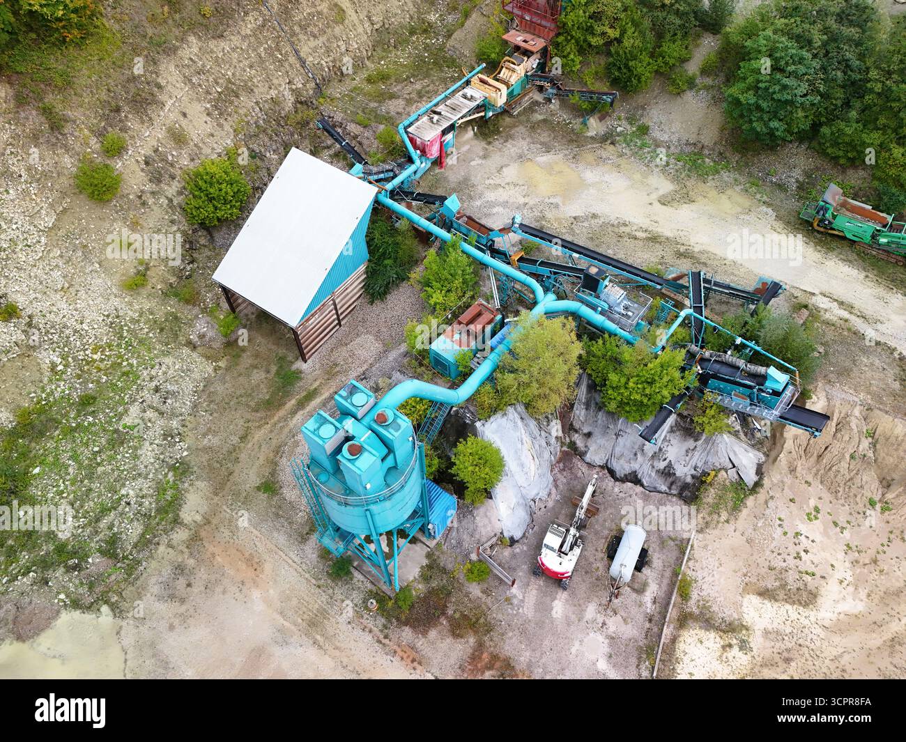Aerial view of quarry with machinery and conveyor system Stock Photo ...