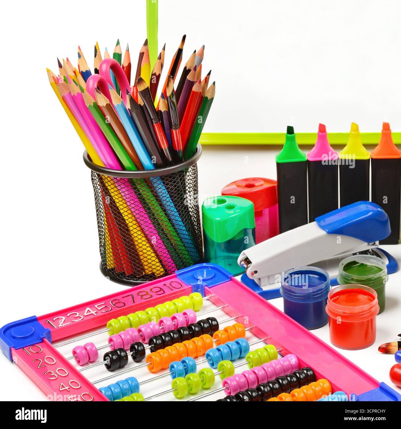 Collection of school supplies, isolated on pure white background. Stock Photo