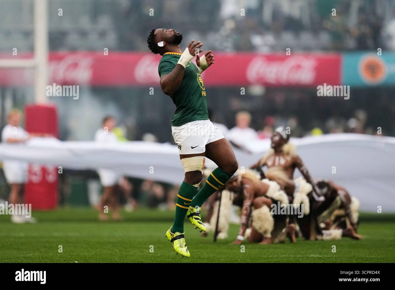 South Africa's Siya Kolisi runs into the field ahead of a rugby ...