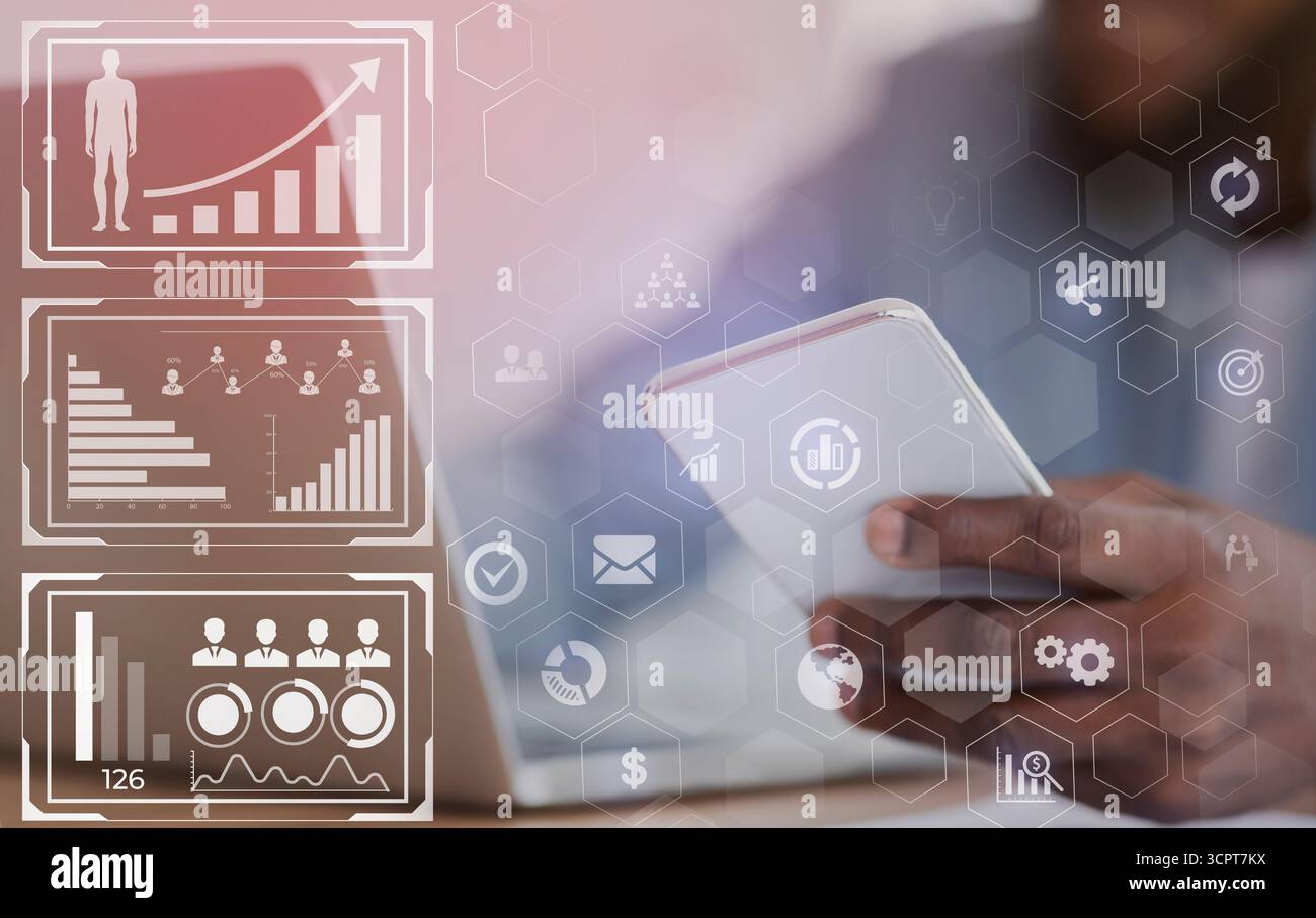 Unrecognizable black HR manager using smartphone and working on laptop Stock Photo