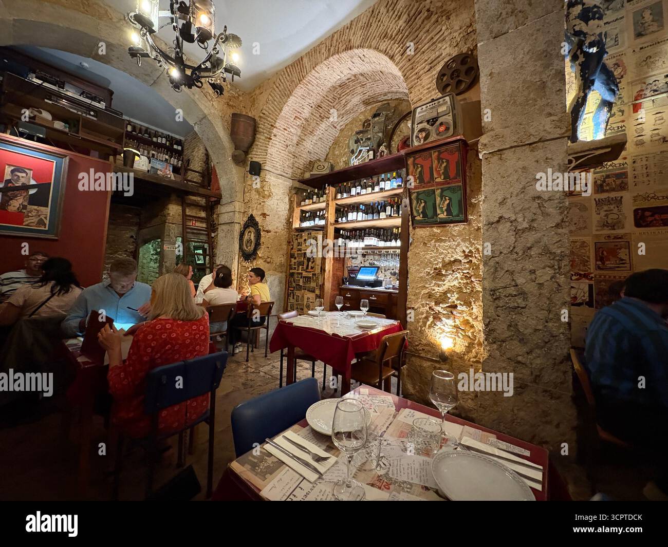 Lisbon restaurant interior, customers enjoying dinner at the Taberna Anti Dantas restaurant on R. São José 206, Portugal,Europe - Smartphone Captured Stock Image