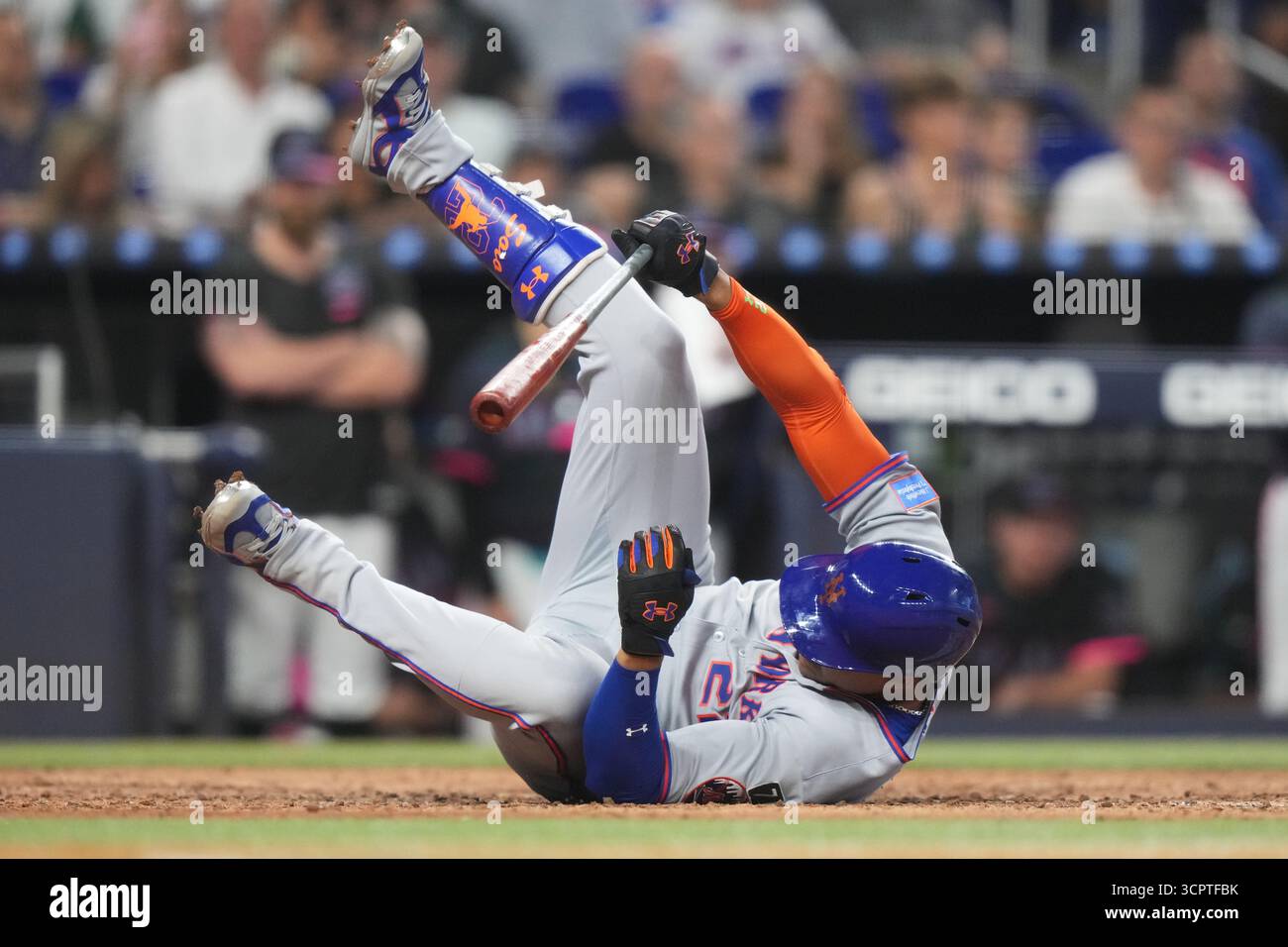 New York Mets' Juan Soto falls to the field after being hit by a pitch ...