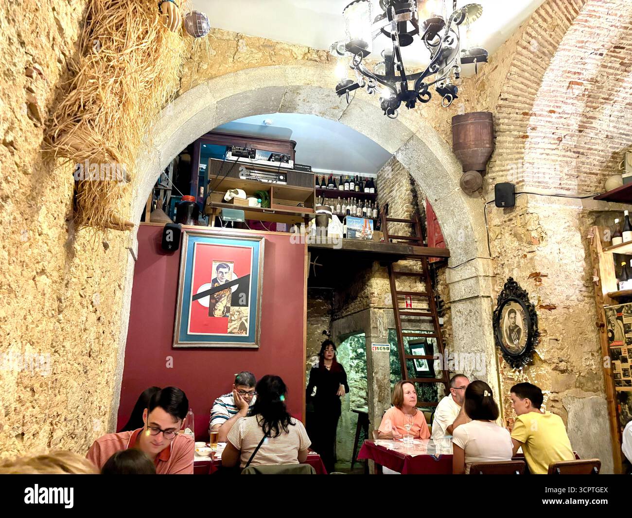 Lisbon restaurant interior, customers enjoying dinner at the Taberna Anti Dantas restaurant on R. São José 206, Portugal,Europe - Smartphone Captured Stock Image