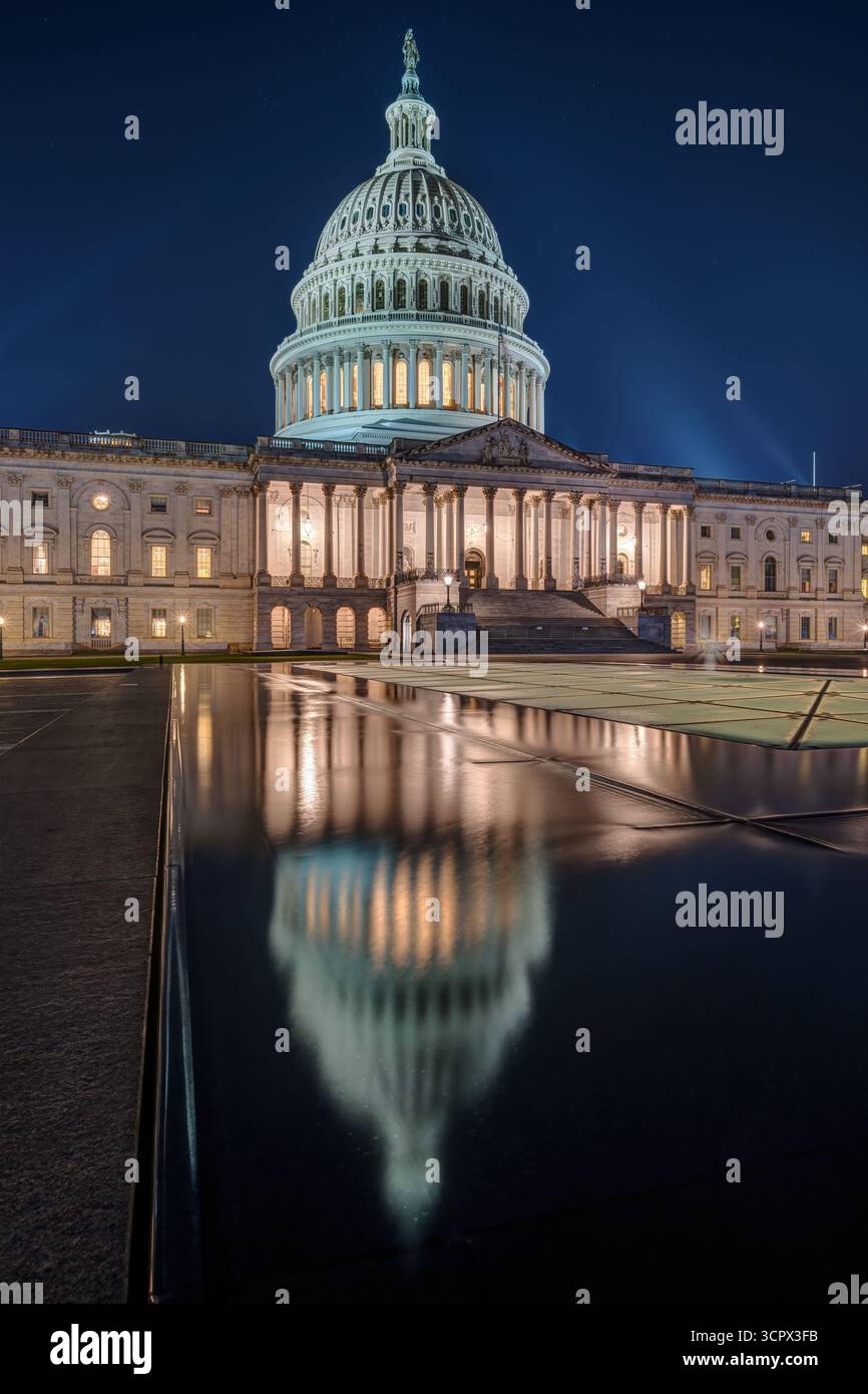 The illuminated U.S. Capitol Building in Washington D.C. at night with ...