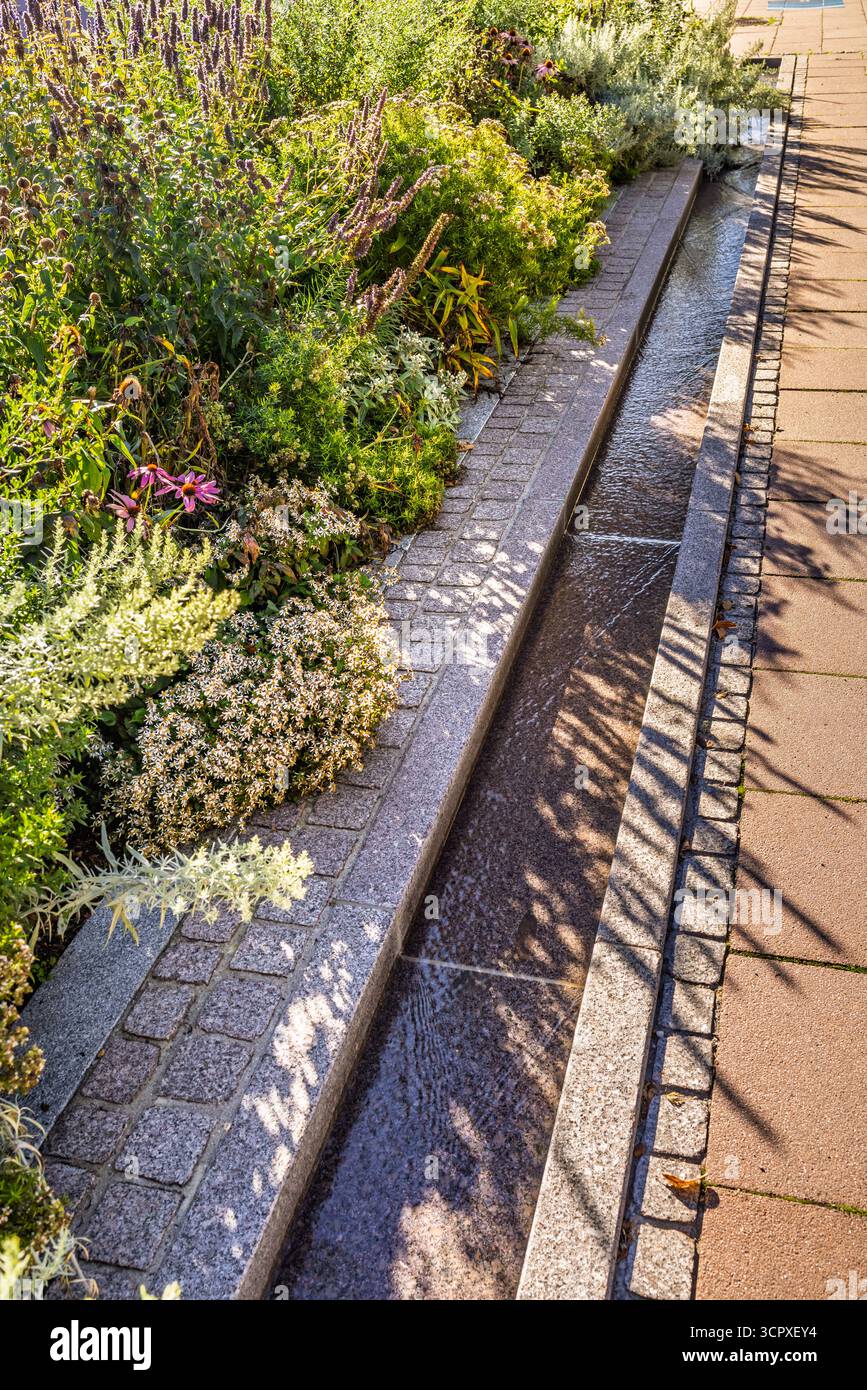 Small waterway along walkway hi-res stock photography and images - Alamy