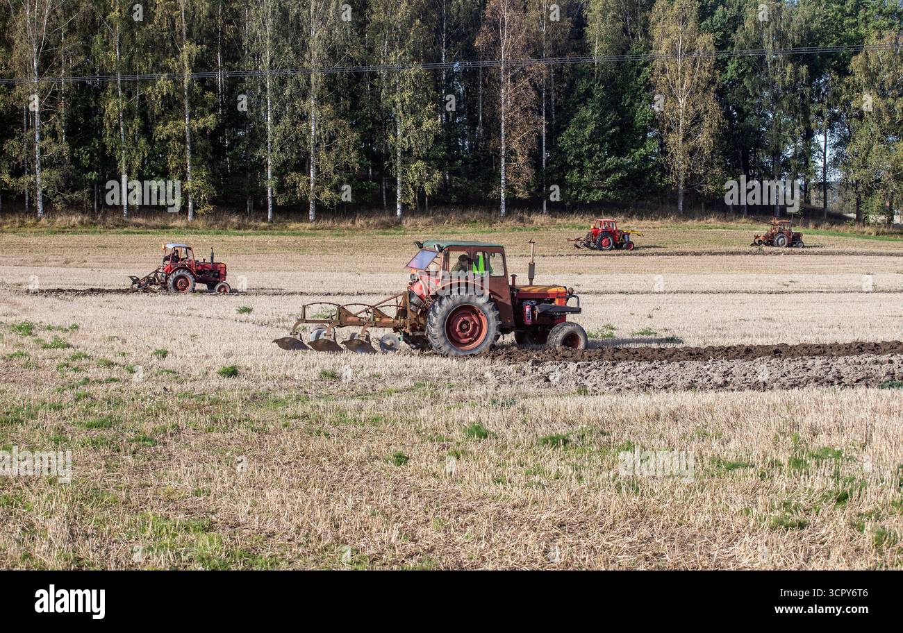 ploughing competition with older tractors and equipment Stock Photo