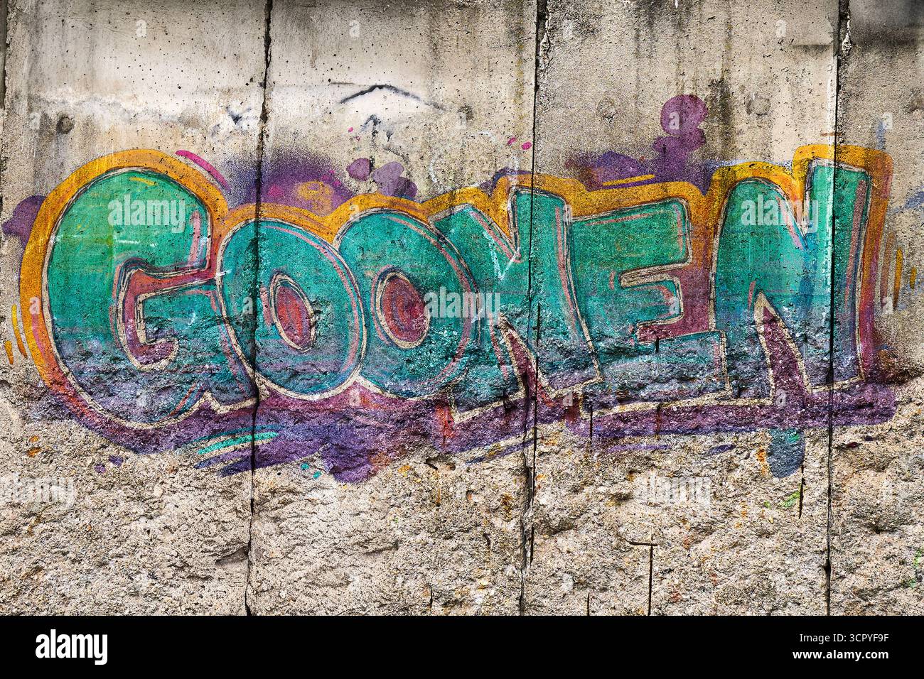 Germany - September 27, 2025: PHOTOMONTAGE, graffiti on a wall with the ...