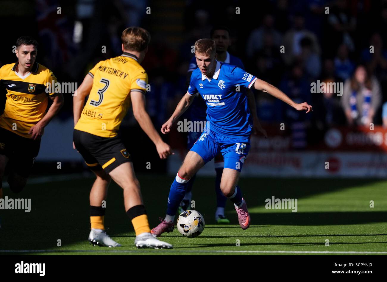 Rangers' Oliver Antman (right) and Livingston's Adam Montgomery battle ...