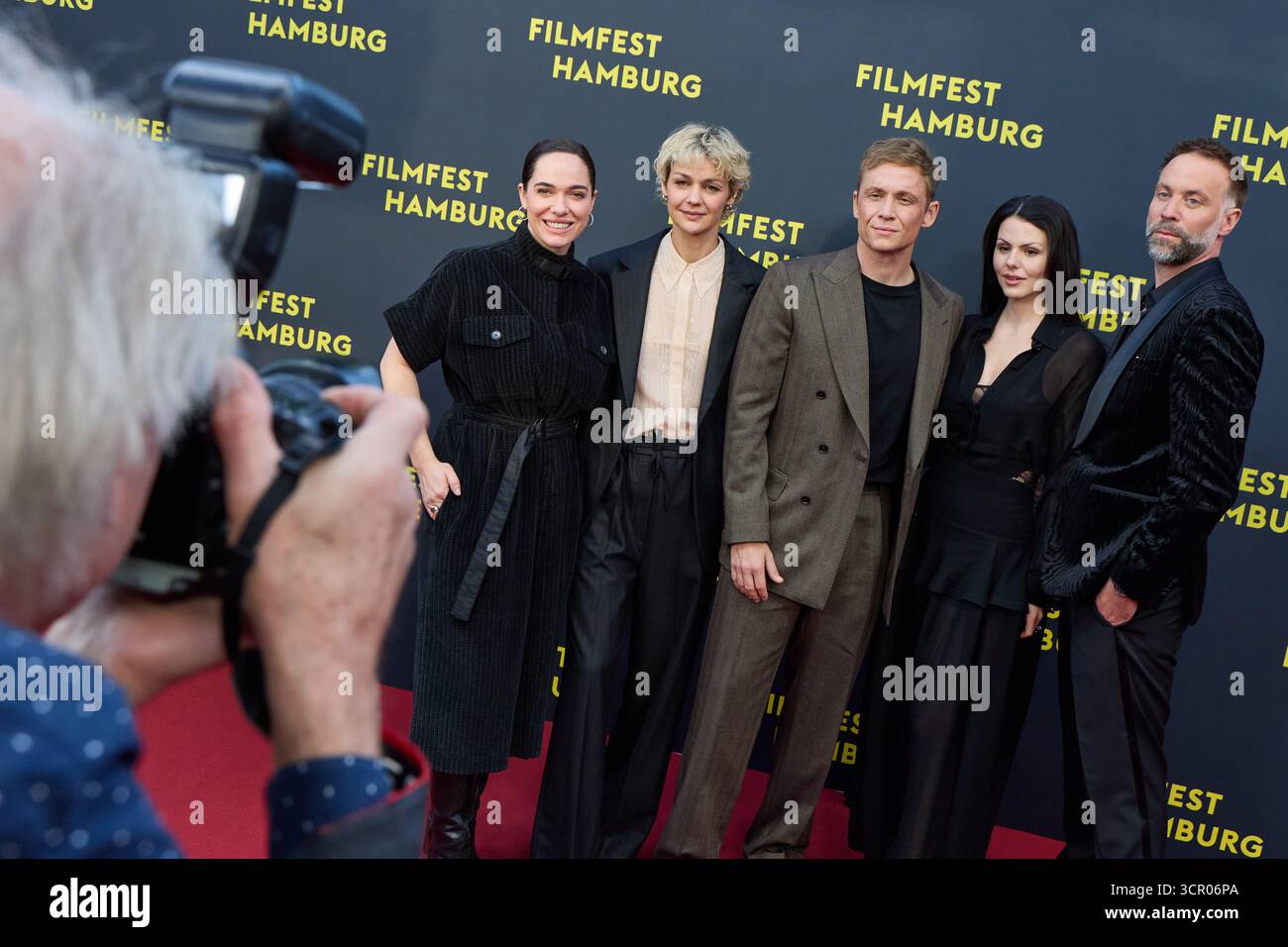 Hamburg, Germany. 28th Sep, 2025. Director Erik Schmitt (r) and actors ...