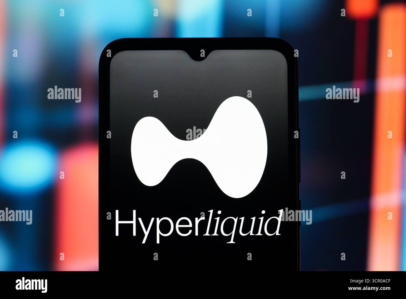 In this photo illustration, the Hyperliquid (Hyper Liquid) logo is seen  displayed on a smartphone screen Stock Photo - Alamy
