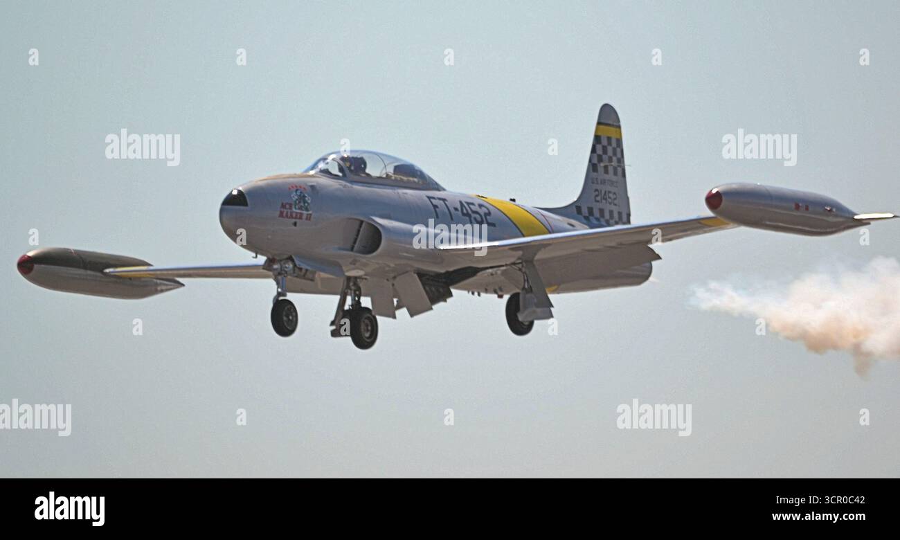 Canadair CT-133 jet trainer , in USAF markings, trailing smoke during ...