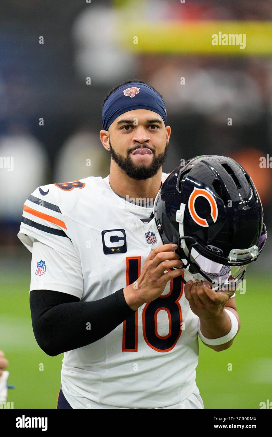 Chicago Bears quarterback Caleb Williams walks onto the field before ...