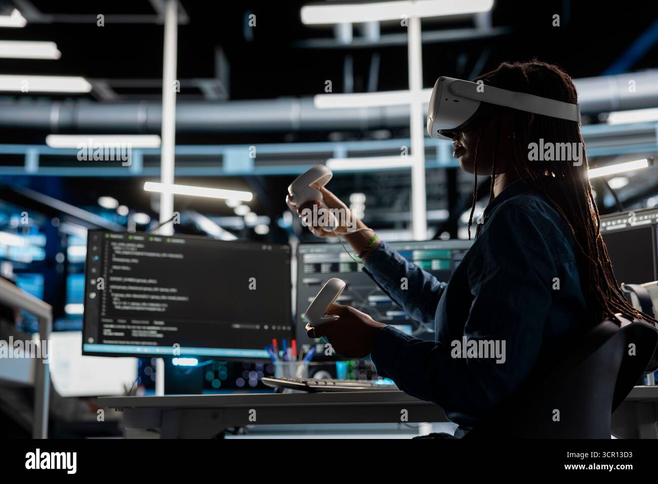 Data center engineer wearing VR equipment using artificial intelligence neural networks technology. Server farm employee using virtual reality headset and AI programming language to configure hardware Stock Photo