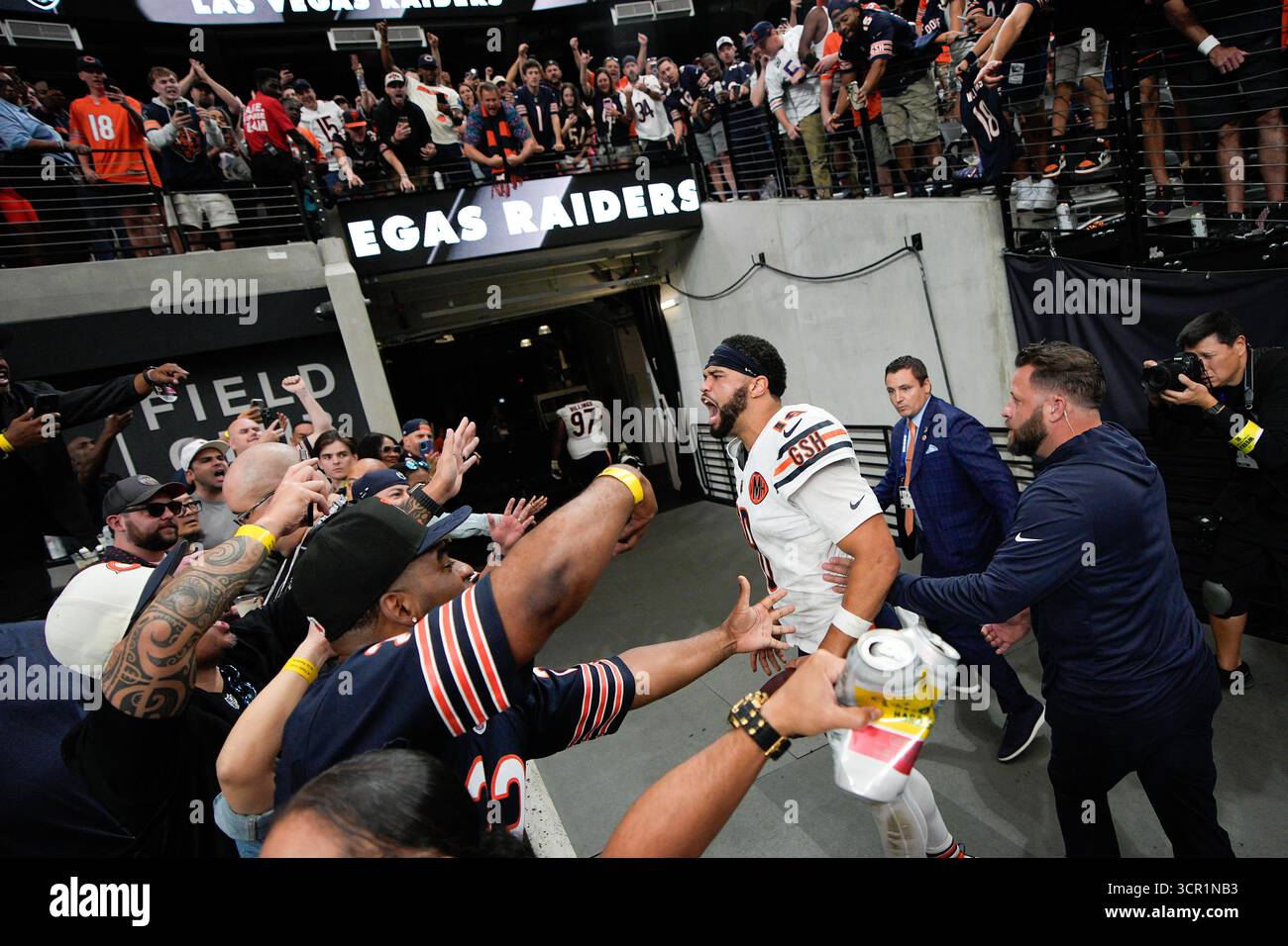 Chicago Bears quarterback Caleb Williams (18) celebrates with the fans ...