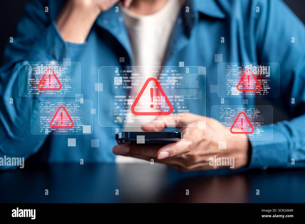 Cybersecurity warning concept with alert, data breach risk, malware attack, and online security Stock Photo