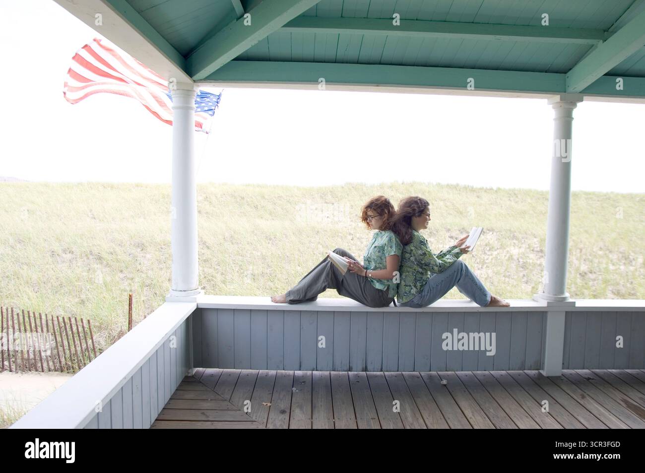 Two women sit on porch hi-res stock photography and images - Alamy