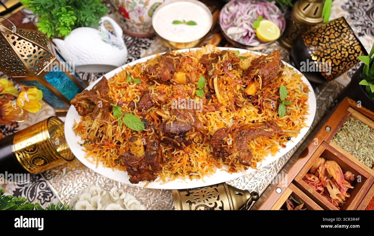 Mutton Biryani plated in high-end restaurant style, offering luxury dining experience with authentic Indian cuisine — aromatic, flavourful, visuals Stock Photo