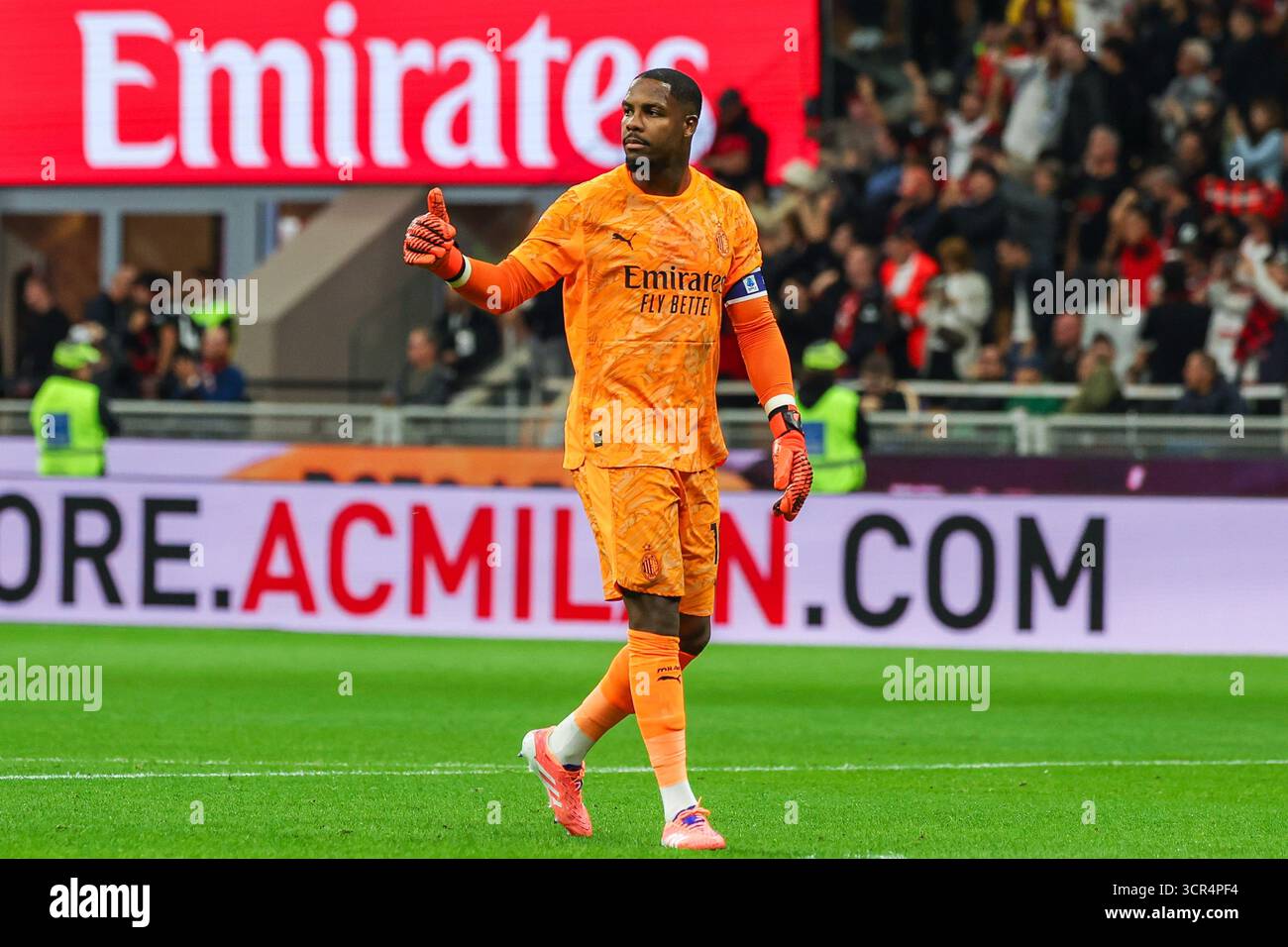 Mike Maignan of AC Milan gestures during Serie A 2025/26 football match ...