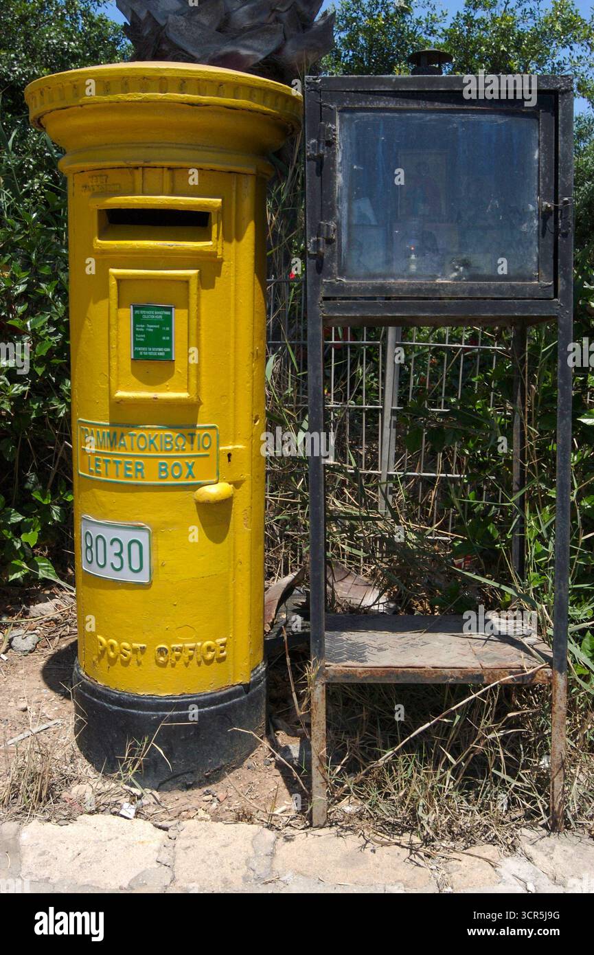 Yellow post box on the island of Cyprus Stock Photo - Alamy