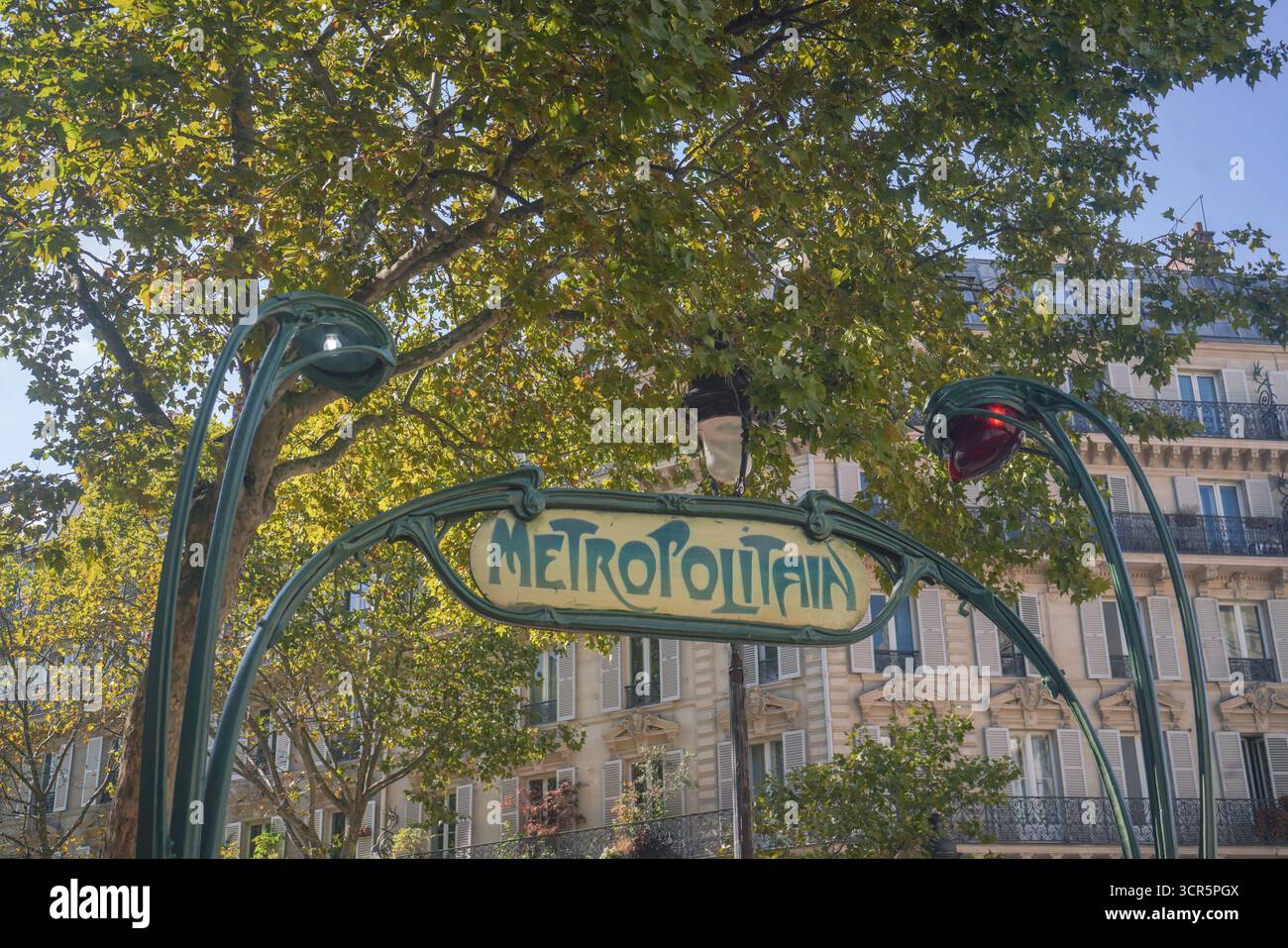 Art Nouveau Métropolitain sign, designed by Hector Guimard, above Gare ...