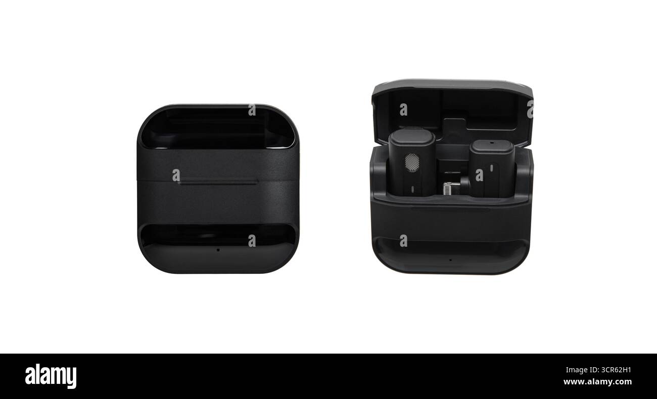 Black wireless microphone charging case, closed and open with two modules inside, isolated. Stock Photo