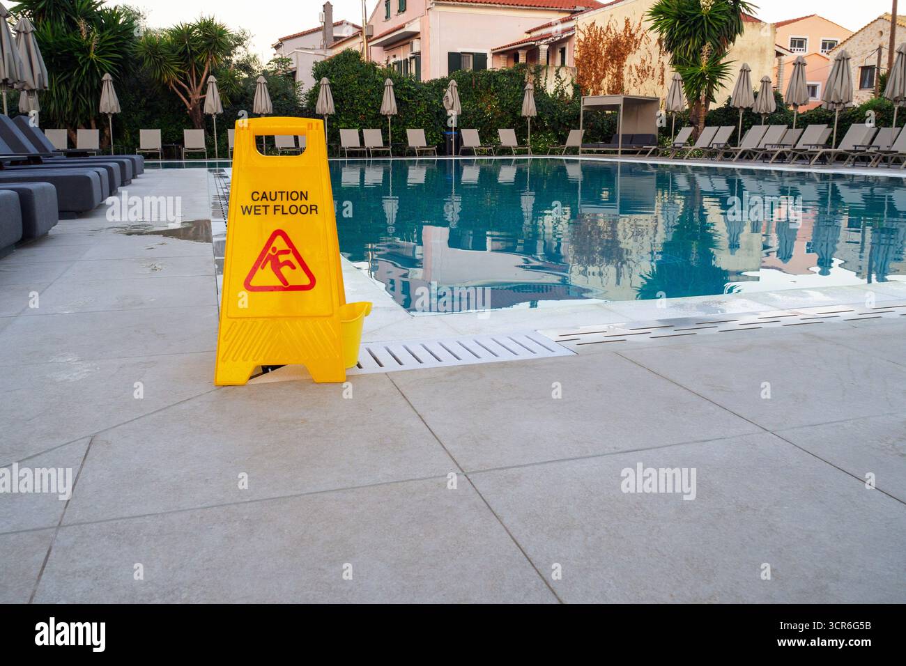 Caution wet floor signs hi-res stock photography and images - Alamy