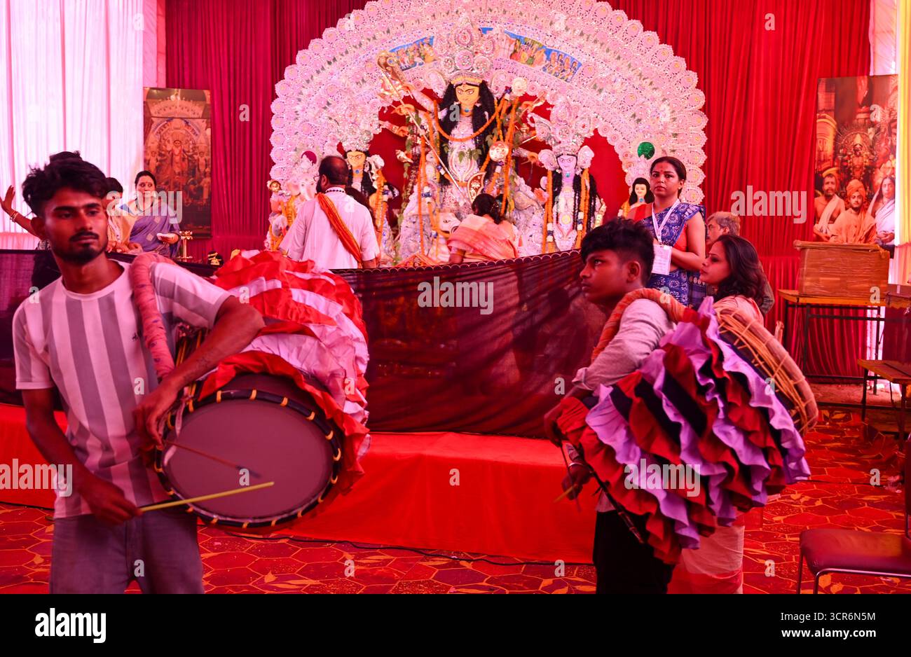 India. 04th Mar, 2034. GURUGRAM, INDIA - SEPTEMBER 29: A Hindu priest performs Maha Saptami Bhog Aarti to Goddess Durga during the Durga Puja festival at the Community Centre in Sector-46, organised by Sahashrabdi Durga Puja Samity near Huda Market on September 29, 2025 in Gurugram, India. (Photo by Parveen Kumar/Hindustan Times/Sipa USA) Credit: Sipa USA/Alamy Live News Stock Photo