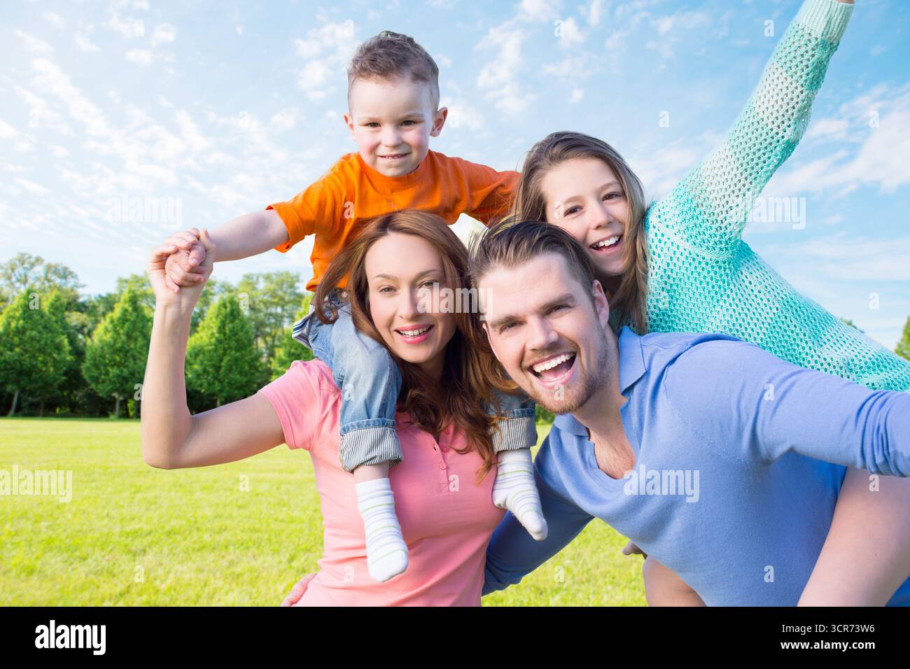 Childhood family with four children hi-res stock photography and images ...