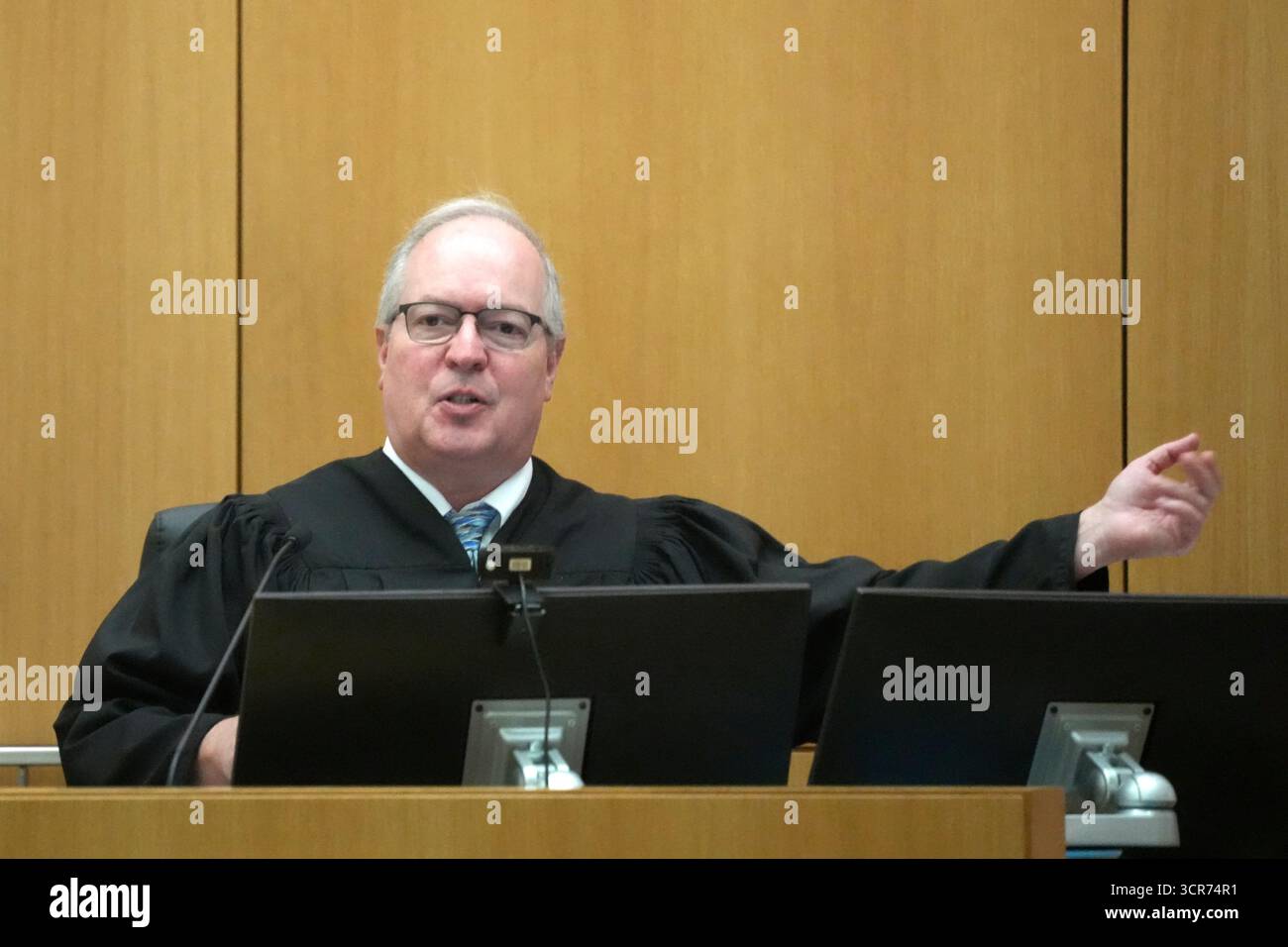 Maricopa County Superior Court Judge Mark H. Brain gestures to a