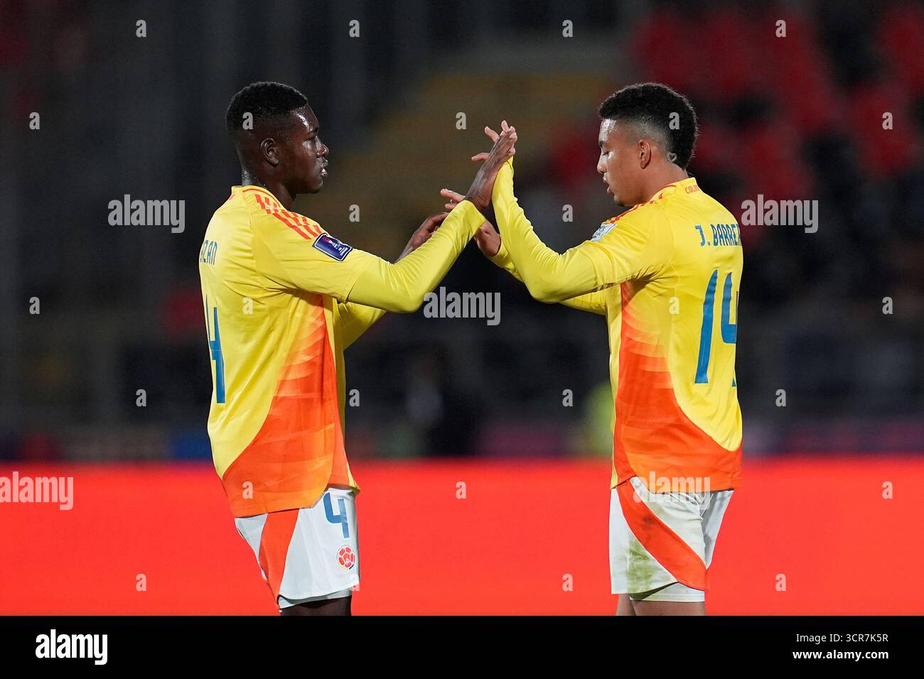 Colombia's Julian Bazan, left, and Jordan Barrera celebrate after