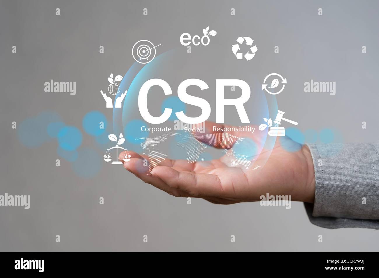 Corporate social responsibility CSR concept with eco icons above a ...