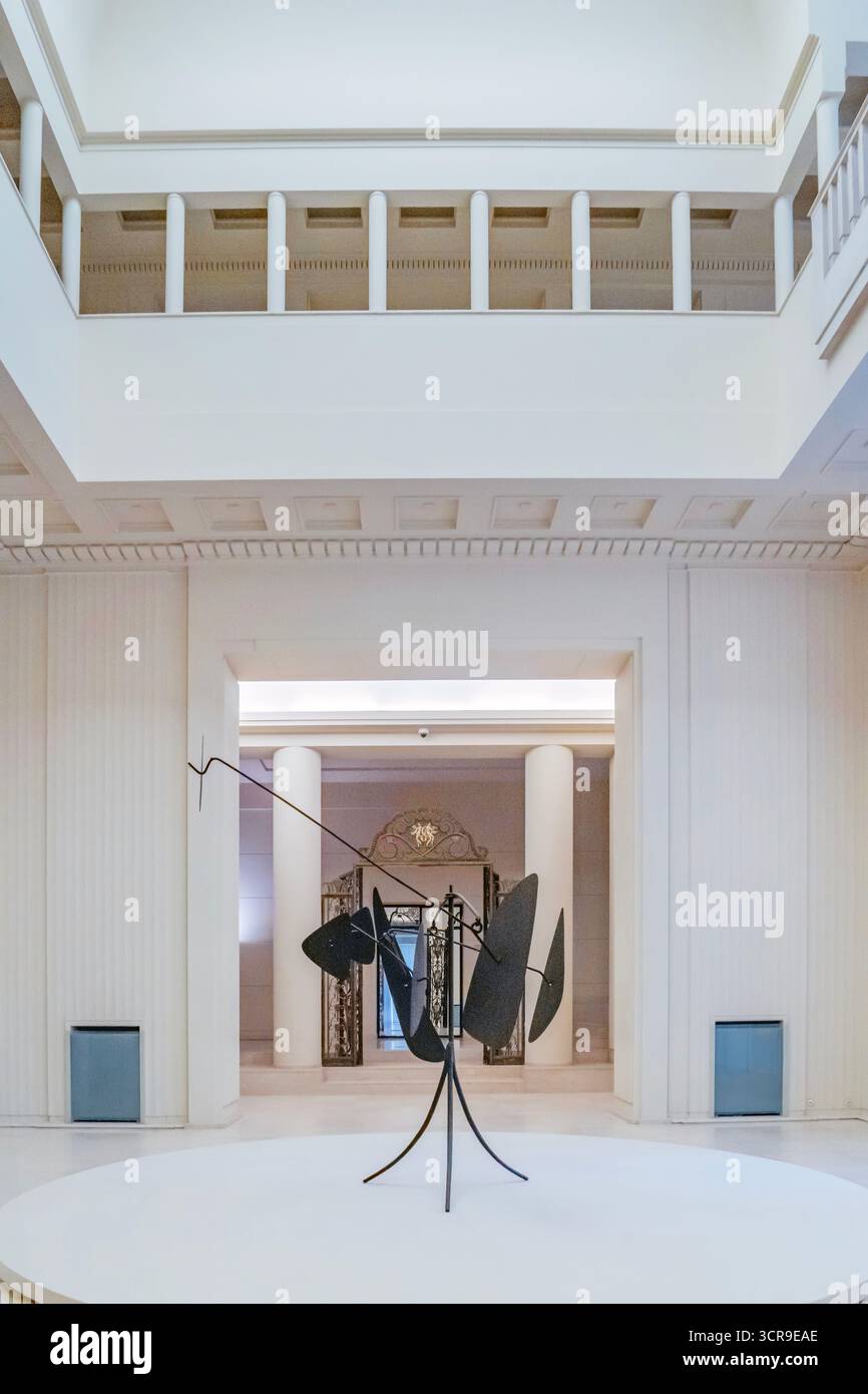 Classic Art Deco interior hall with columned loggia and a central ...