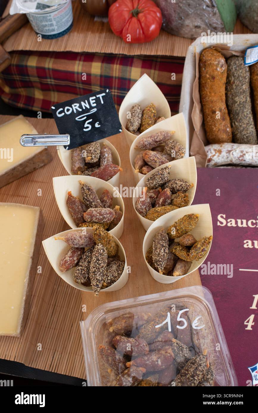 Display of Saucissons, or Dry Sausage,, including Small Saucissons in form or Cornets or Cones, on Market Stall Aix-en-Provence Provence France Stock Photo