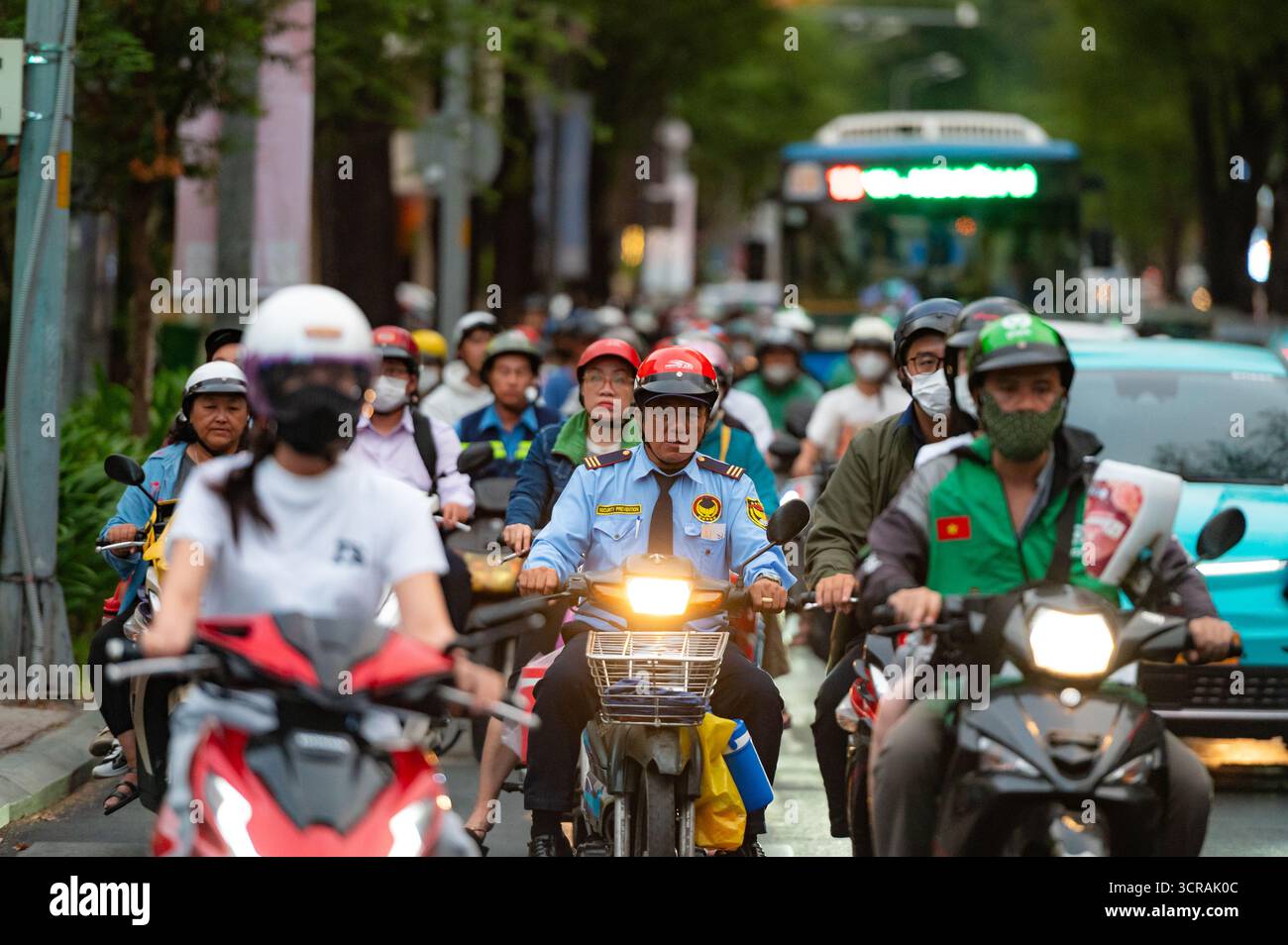 Ho Chi Minh, Vietnam, 03.14.2024 Moped riders in Ho Chi Minh City ...