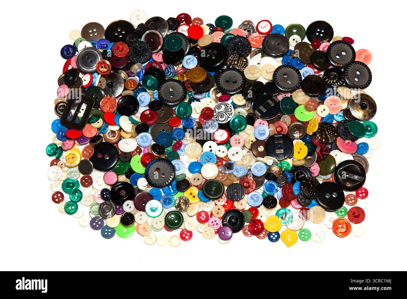 Multi-colored buttons on a white background close-up. Stock Photo