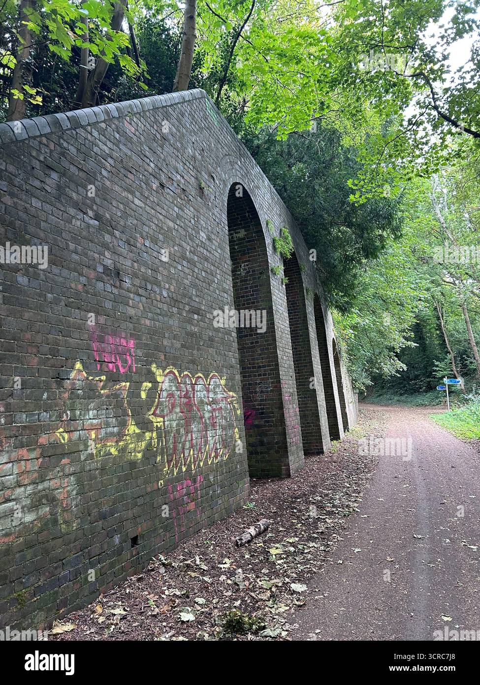 Old railway arches with graffiti on the Nickey Line, Harpenden - Smartphone Captured Stock Image
